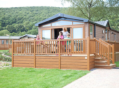 AB Sundecks Picket Panel and Steps on raised Decking with family