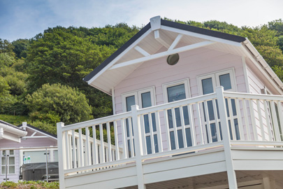 AB Sundecks Picket Glass on raised decking on water over looking the lake